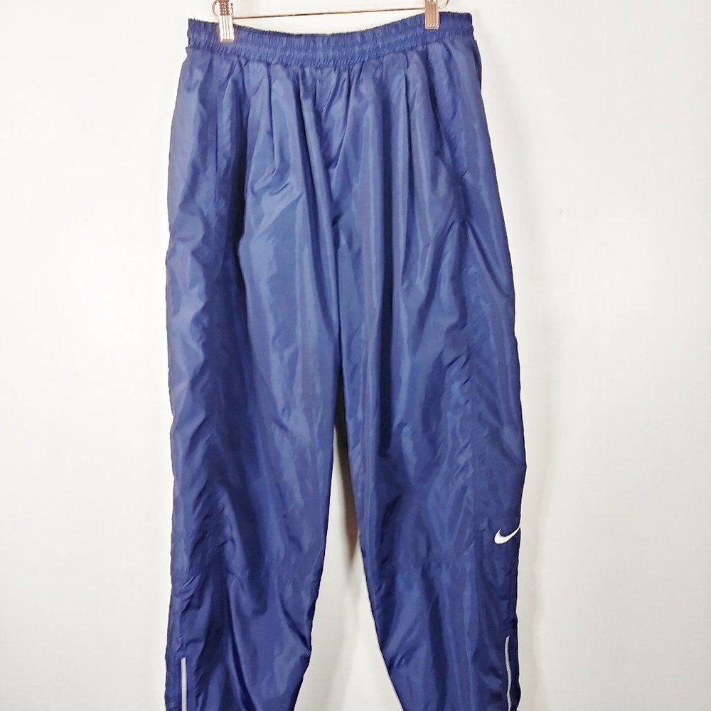 NIKE tapered training pants size L
